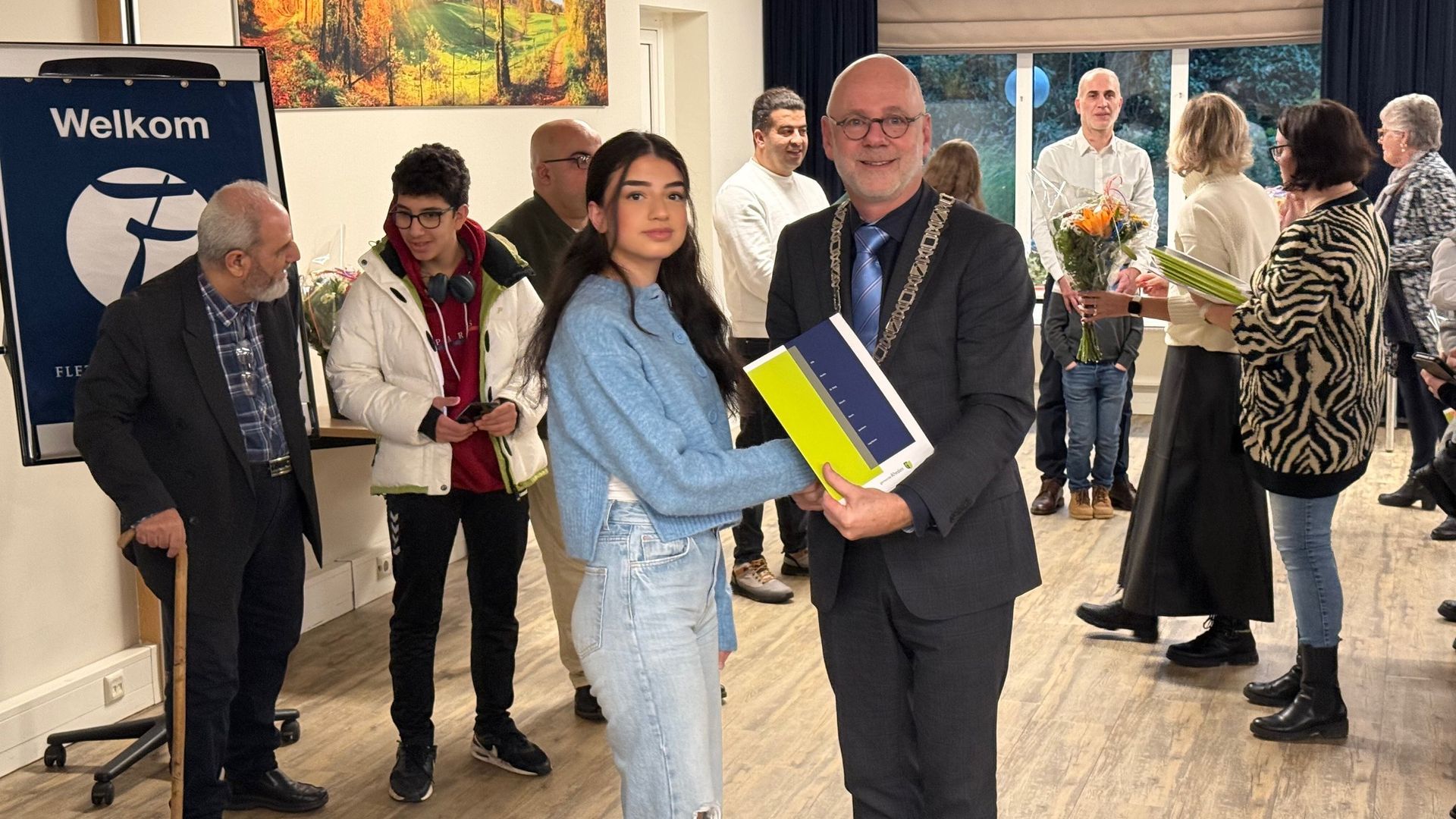 Zestien nieuwe Nederlanders ontvangen bewijs van nationaliteit in Rheden