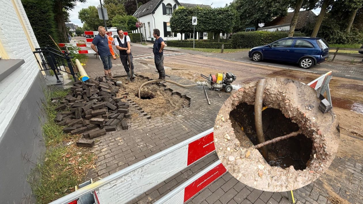 Waterleiding springt bij Dorpsplein in Rheden: straten onder water Foto: Martin Slijper